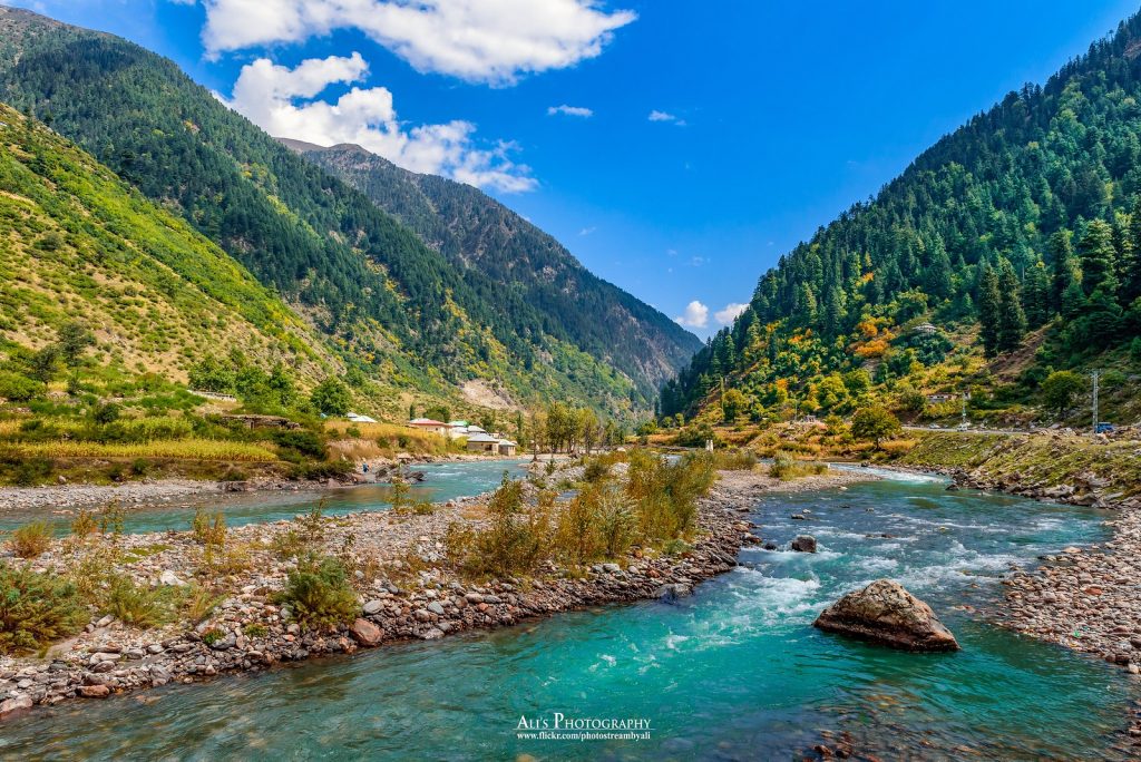 Image of River Kunhar at Naran with the pine forest valley in the background